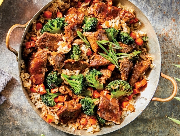 Beef Teriyaki frozen meal kit on a grey background