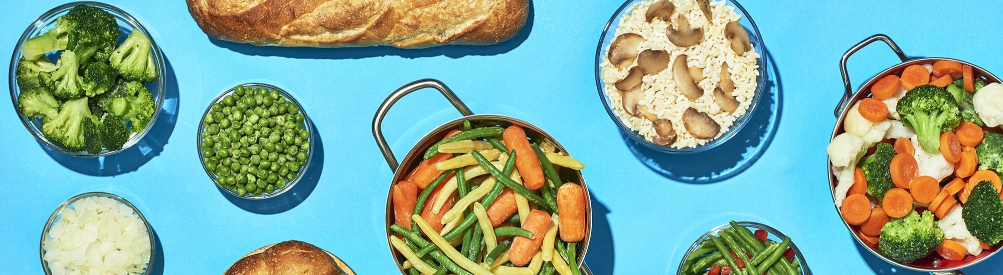 A group of frozen bread and frozen vegetable dishes