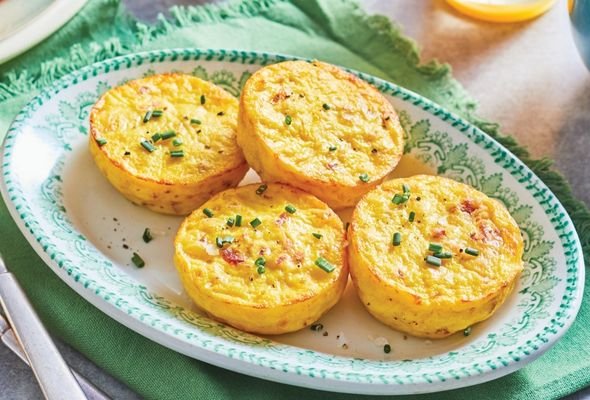 Four Omelette Bites garnished with green herbs.