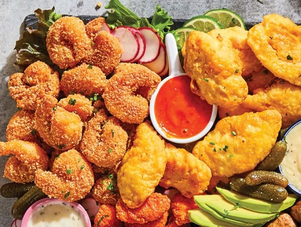 Made from frozen appetizers on a platter with vegetables