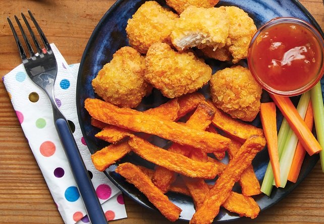 Cooked from frozen Chicken Nuggets and sweet potato fries with dipping sauce