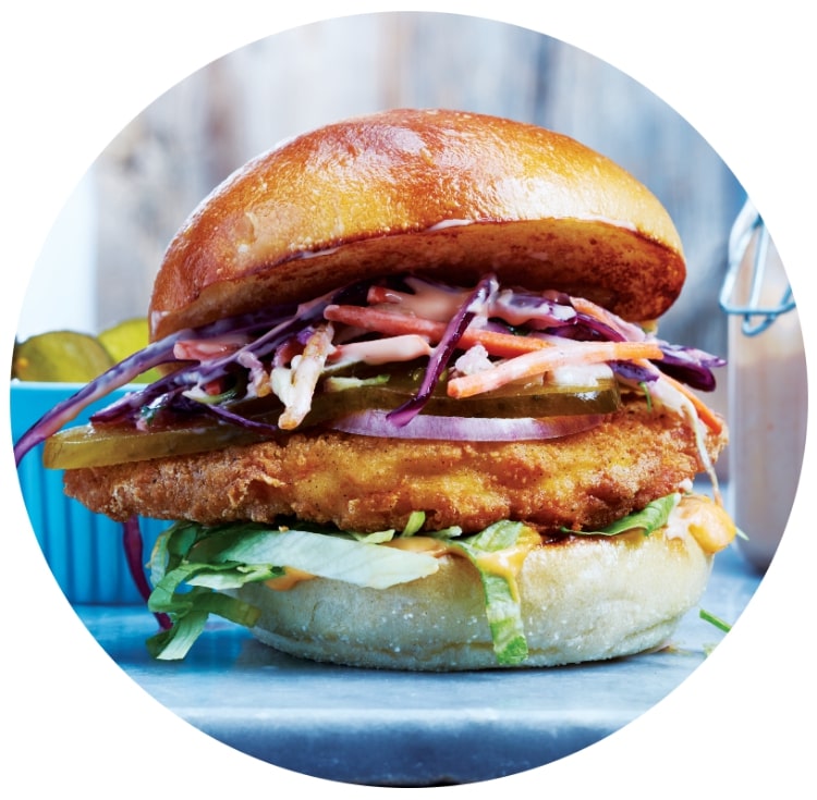 Cooked from frozen Breaded Chicken Breasts on a toasted bun with toppings