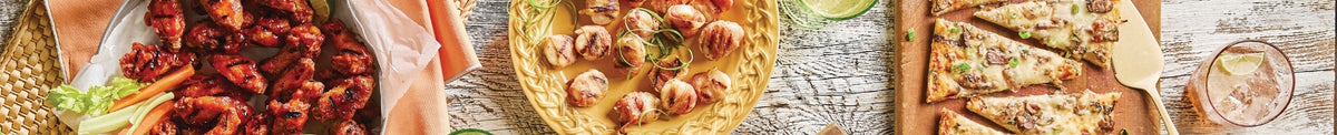 Frozen appetizers prepared on the grill on a wooden table