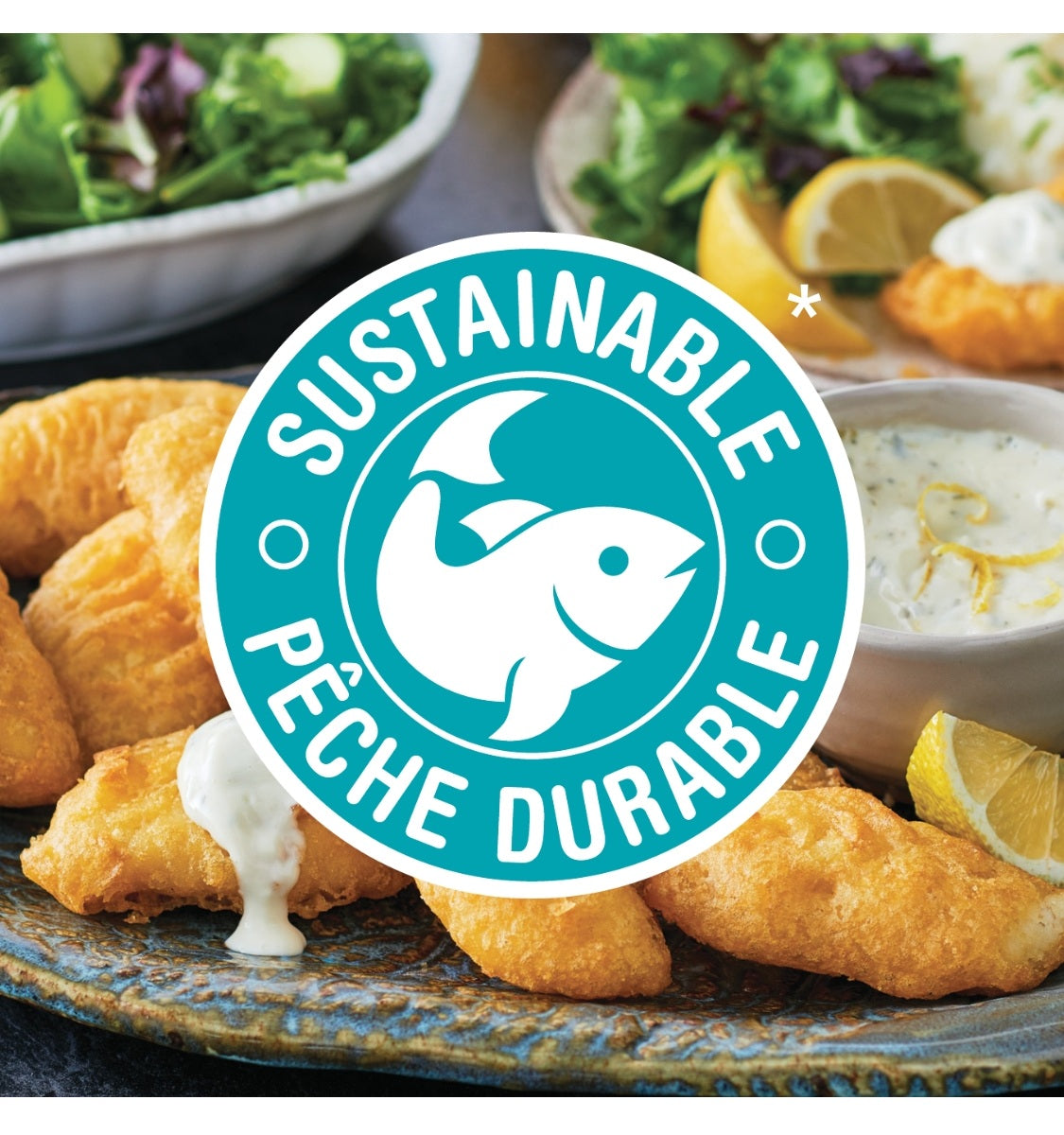 Fish sticks on a plate with a 'Sustainable' logo and salad in the background.